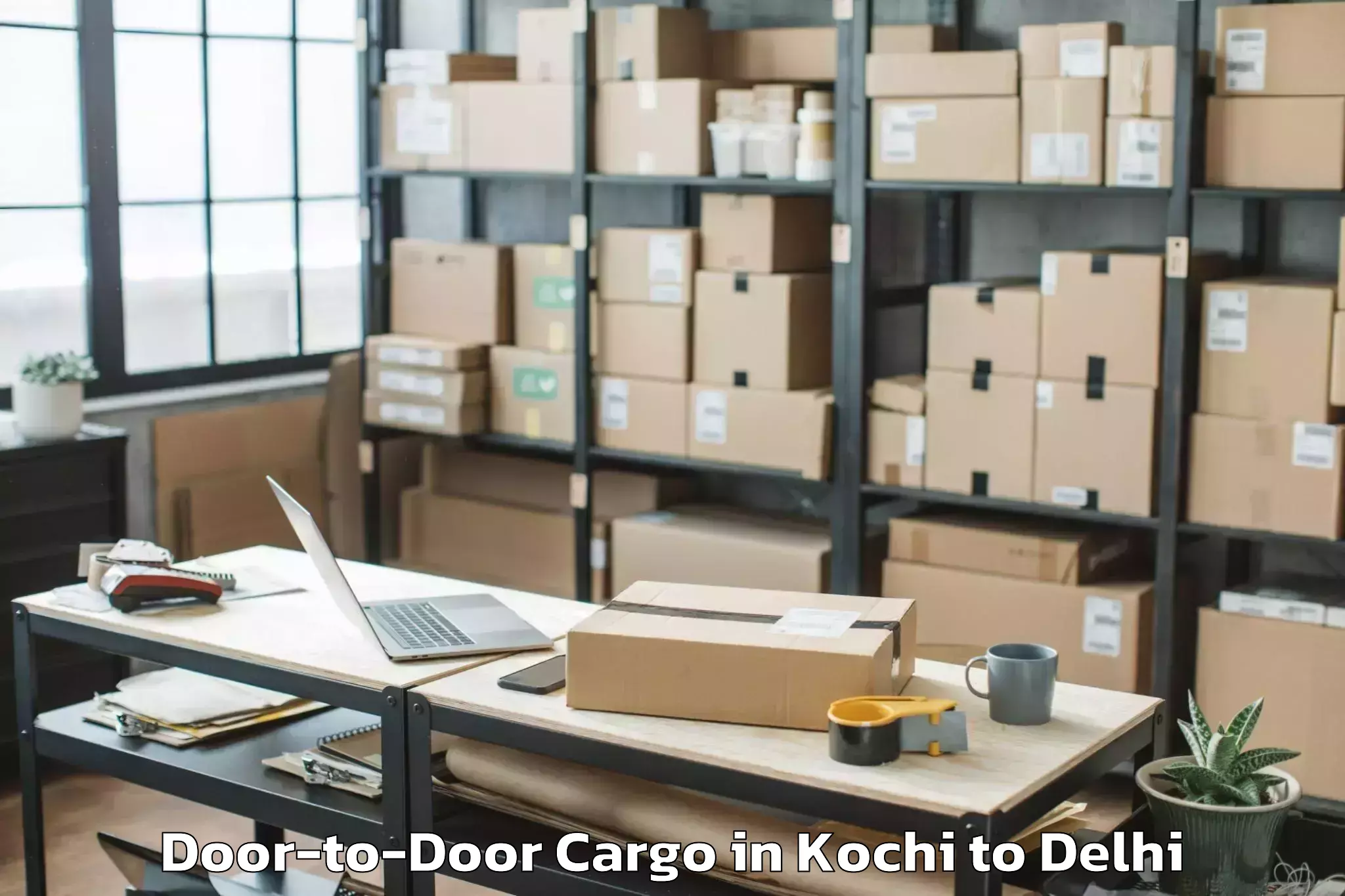 Hassle-Free Kochi to Ambience Mall Rohini Door To Door Cargo